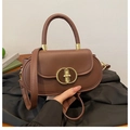 Chic brown matte leather handbag with golden double-circle metal clasp and top handle - Coffee