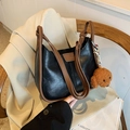 Retro black leather tote with brown trim and cute poodle charm on a chair - With Pendant / Black