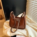 Vintage brown leather tote bag with FASHION label and textured finish in warm light - No Pendant / Brown