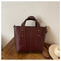 Burgundy faux leather bucket bag with white contrast stitching and gold rivets - Burgundy