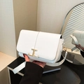 Elegant white crossbody bag with modern gold T-shaped buckle and broad leather strap - White