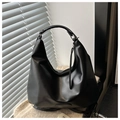 Detail of black crescent hobo bag with sleek matte texture and stylish leather zipper pull - No Pendant / Black