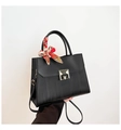 Black matte leather tote with square metal buckle and decorative printed silk scarf handle - Black