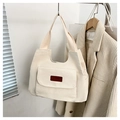Minimalistische gebroken witte canvas draagtas met voorvak en bruin lederen label - Wit
