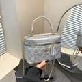Silver quilted bucket bag with gold petal accent and chain strap for women - Silver