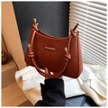 Deep brick red lace textured handbag with knotted handle and gold metal hardware - Brown