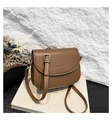 Brown leather saddle bag with gold hardware and adjustable strap for women - Brown