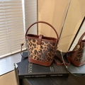 Vintage leopard print bucket bag with brown leather trim and golden metal turn-lock - No Pendant / Brown