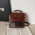 Mochila retro de PU marrón oscuro con lazo y ventana de PVC transparente para mujer - Marrón