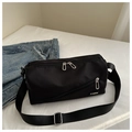 Black nylon crossbody travel bag with fashion tag and silver zipper details - Black