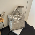 Quilted champagne metallic tote bag with down-like padding and minimalist gold accents - Gold