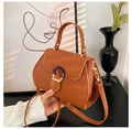 Brown litchi grain leather crossbody bag with resin buckle and top handle - Brown