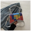 Detail of color-block hourglass bag with knotted handles and adjustable strap - Silver