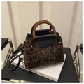 Leopard print faux suede tote bag with brown acrylic handles and black leather trim - Coffee