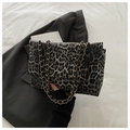 Leopard print crossbody bag with gold chain strap in grey and black textured faux leather - Black