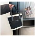 Detail of contrast stitch handbag with faux shearling trim and Fashion leather label - Black without Pendant
