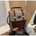 Detail eines Tweed-Leder-Rucksacks mit Markenlogo im Vintage-Preppy-Stil für Studentinnen - Grau und Braun Patchwork (Kaffee)