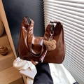 Brown glossy leather tote bag with teddy bear charm and striped ribbon detail - Brown with Pendant