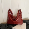 Chic burgundy patent leather hobo bag with adjustable wide strap and glossy finish - Red Without Charm