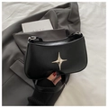 Chic black faux leather underarm bag featuring a metallic silver star ornament - Black