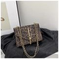 Chique schoudertas met luipaardprint, gouden ketting en kwastdetail in bruine afwerking - Grijs Stijl 1