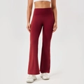 High waisted dark red yoga flare pants for women showing the slim fit elastic fabric - S / Bottoms / Burgundy
