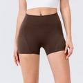 Women's high waisted dark brown yoga shorts with side pockets and elastic fit - S / Bottoms / Dark Brown
