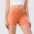 Women's high waist yoga shorts in vibrant orange with seamless sculpting stitching - Tropical Orange