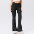 Women's black flared yoga pants with cross V-waist, side pockets and slit hem detail - S / Bottoms / Black