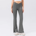 Cross waist flared yoga pants in dark grey with side pockets and split hems - S / Bottoms / Dark Gray