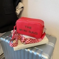 Red mini camera bag in pebble leather with wide geometric strap and logo print - Rose Red