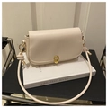 Minimalist creamy white flap crossbody bag with golden ring clasp and knotted rope strap - White