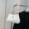 Chic white baguette bag with gold metal trim and knot detail on the shoulder strap - White