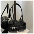 Glossy black underarm bag with double front pockets and silver butterfly charm detail - Black