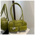 Glossy grass green faux leather shoulder bag with dual front pockets and silver bow charm - Green