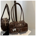 Dark brown faux leather Boston bag with dual front pockets and silver bow charm detail - Coffee