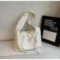 Beige corduroy tote bag with drawstring closure and comfortable wide shoulder strap - Off White