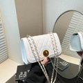 Minimalist white quilted leather crossbody bag with chain strap and gold twist lock - White