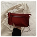 Metallic red rectangular crossbody bag with silver chain strap and zipper detail - Red