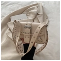 Beige faux leather shoulder bag with silver rivets and metal grommets in biker style - Off White