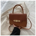 Retro caramel brown crossbody bag with woven texture flap and golden metal clasp - Brown