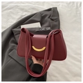 Retro deep burgundy underarm bag with gold crescent hardware and matte leather texture - Red