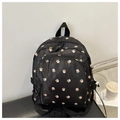 Dettaglio zaino floreale nero in nylon impermeabile con ampi spallacci imbottiti - Nero