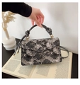 Chic black and white snakeskin pattern square bag with knotted handle and gold hardware - Black