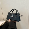 Minimalist black leather star hardware handbag with adjustable shoulder strap for women - Black