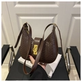 Brown woven leather half-moon shoulder bag with a stylish gold-tone metal twist lock - Coffee