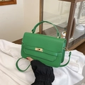 Bright green leather crossbody handbag with metal turn-lock and top handle for women - Green
