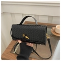 Elegant black woven shoulder bag with gold metal buckle and versatile top handle - Black