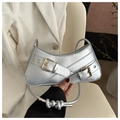 Detail of silver metallic underarm bag featuring retro double straps and knotted PU leather - Silver