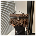 Detail of vintage leopard print box bag with silver zippers and textured leather - Brown